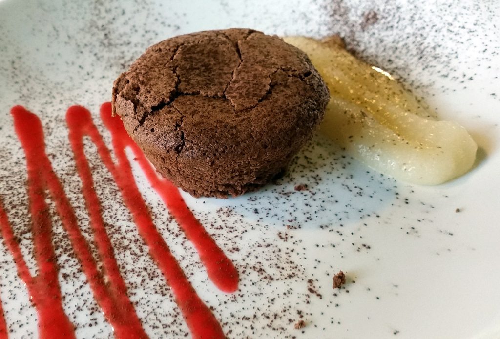 Hot chocolate pudding with pear custard