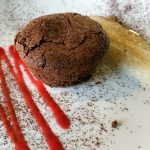 Hot chocolate pudding with pear custard