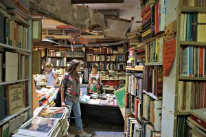 Customers in the Acqua Alta bookshop