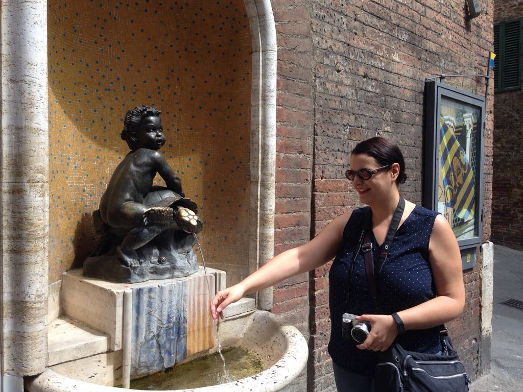 Me taking advantage of the Tartuca Fountain :D