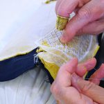 Lady embroidering