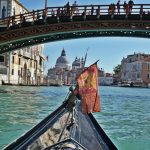On a gondola under Accademia bridge