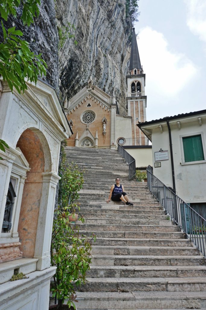 Me on the staircase of Madonna della Corona Sanctuary