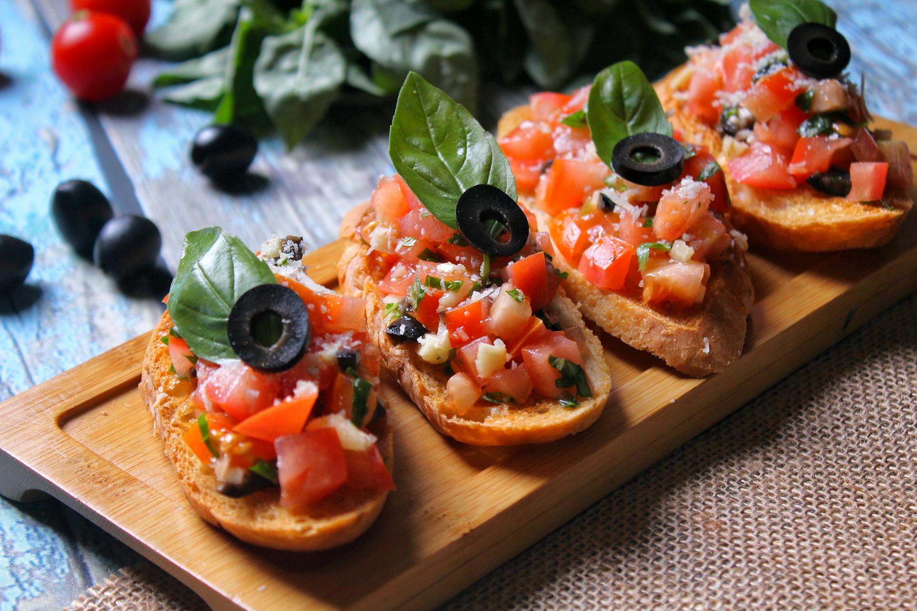 bruschetta with tomatoes black olives and basil Vegan Italian recipes